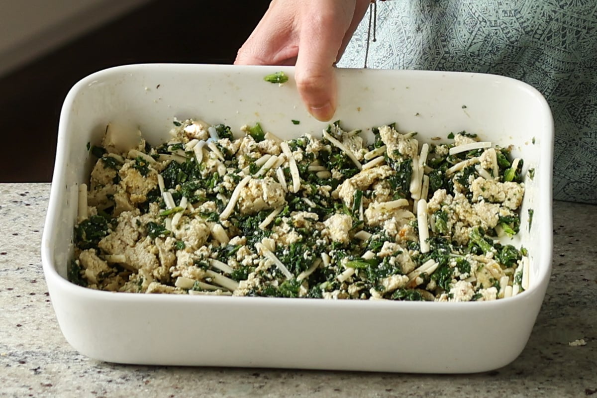 tofu ricotta ingredients in the pan after mixing