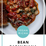 butterbean parmigiana on a plate with toasted sourdough, text overlay