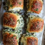 cheesy mushroom sliders on the baking sheet after baking