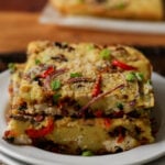 moong dal frittata stacked on a plate