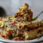 fork taking a bite of moong dal frittata