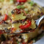 fork taking a bite of moong dal frittata