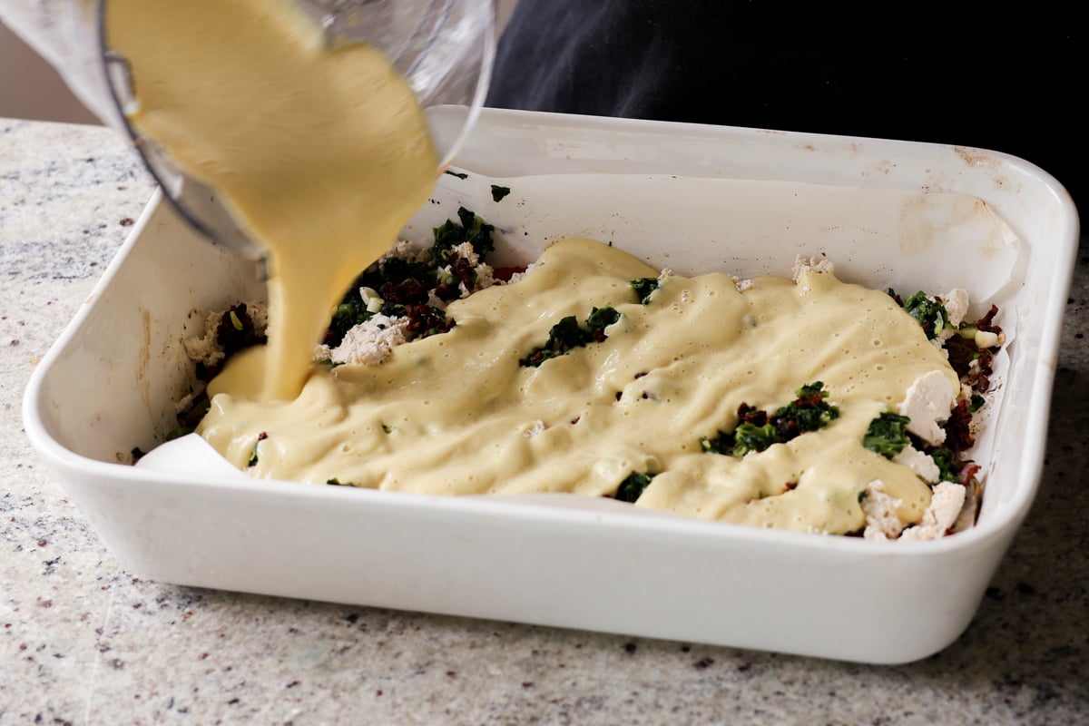 pouring on the frittata batter