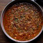 lentil bean stew in the pan after cooking and garnishing