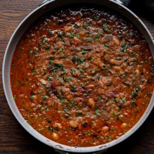 lentil bean stew in the pan after cooking and garnishing
