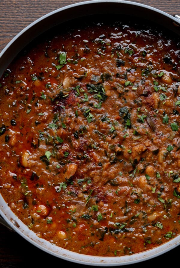 lentil bean stew in the pan after cooking and garnishing