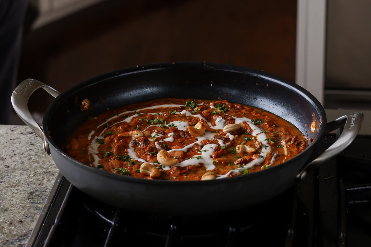 beans korma in the pan after cooking and adding toppings