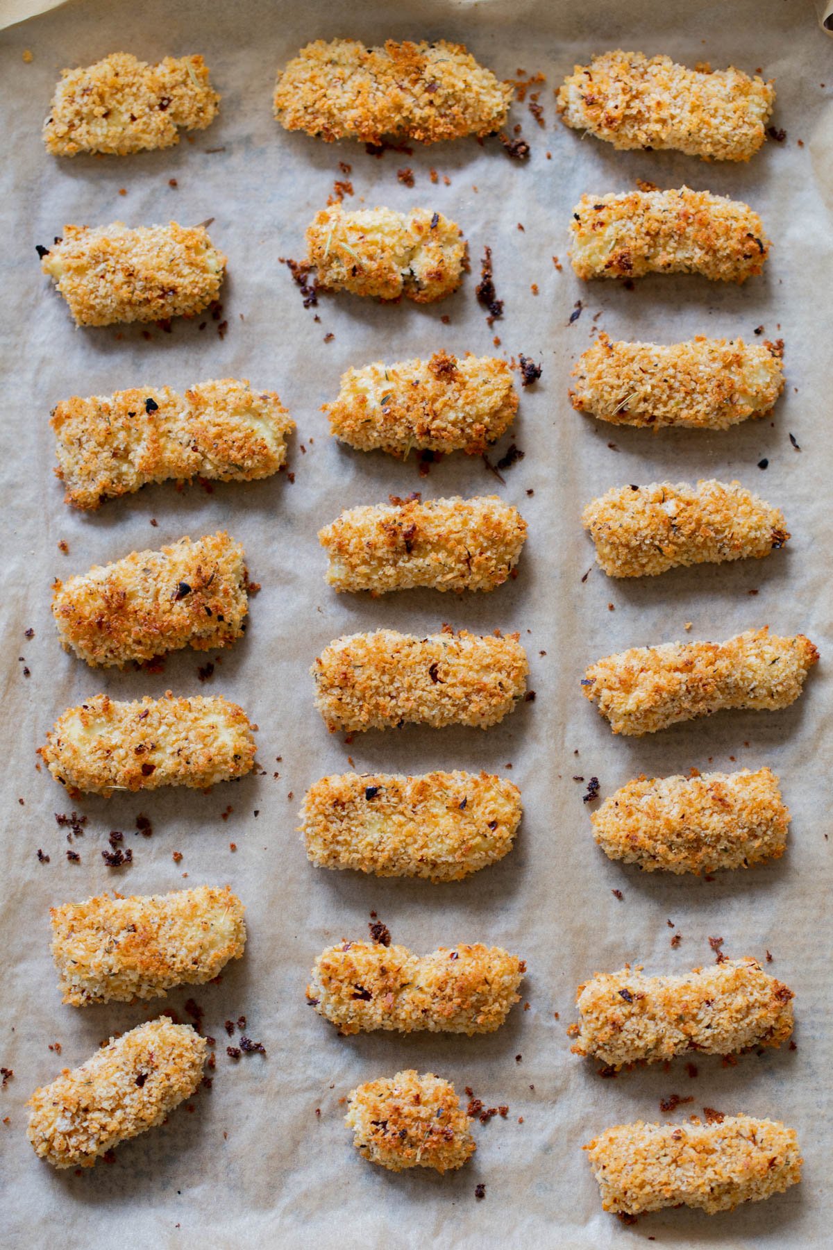 vegan mozzarella sticks on the baking sheet after baking