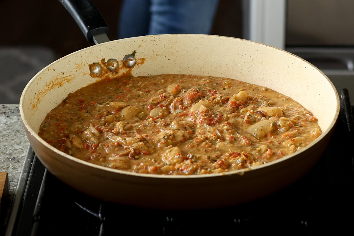 Sicilian pesto sauce butter beans in the pan after cooking