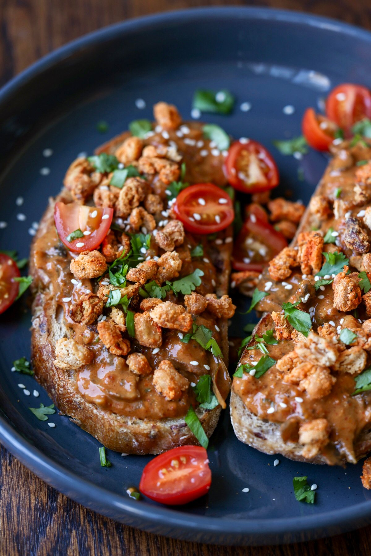 balchao mushrooms served on toast with crispy beans and tomatoes