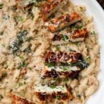 garlic parmesan orzo on a plate with the crispy tofu
