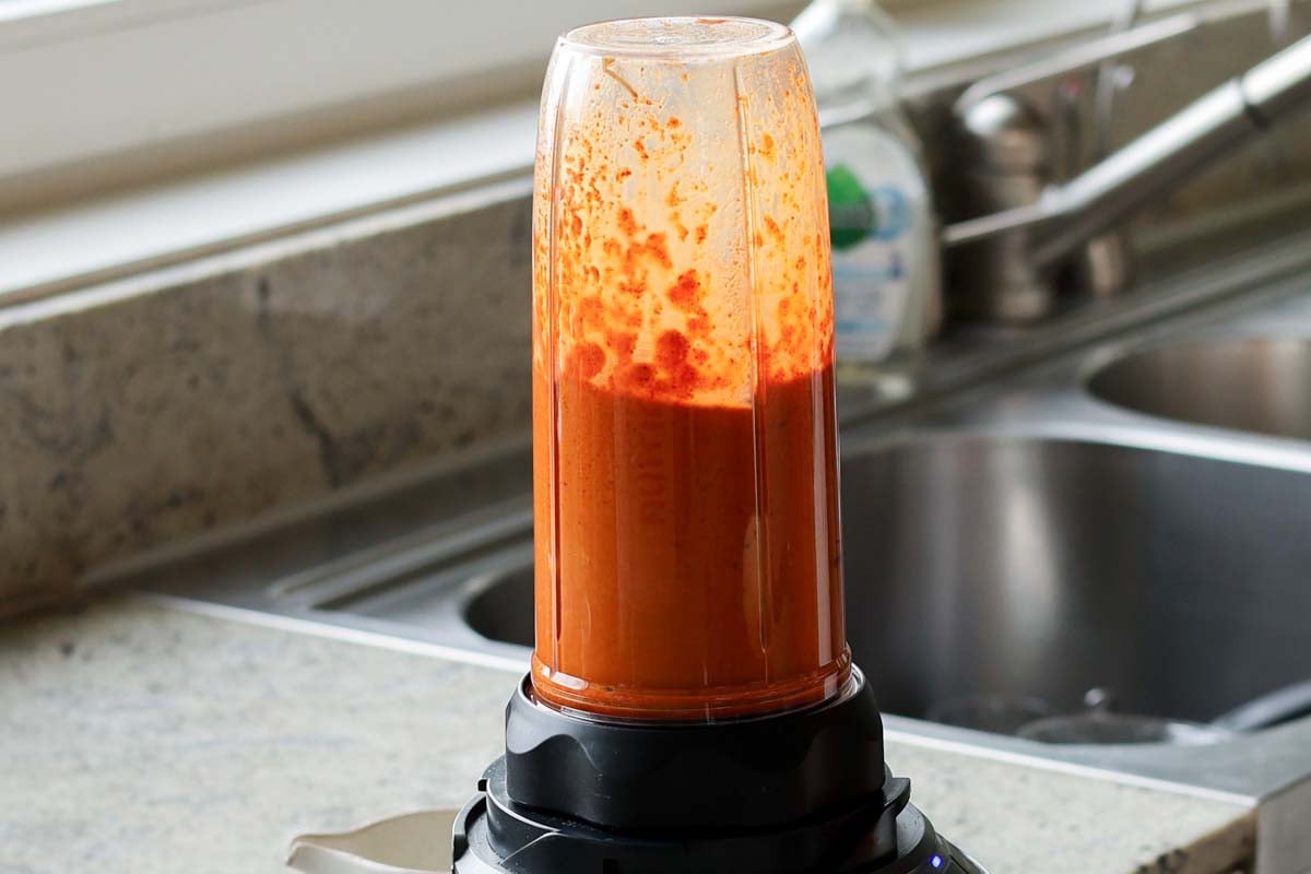 blended tomato curry sauce in the blender