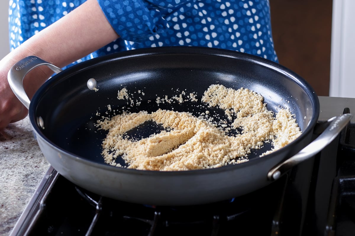 toasted coconut and almond flour in the pan