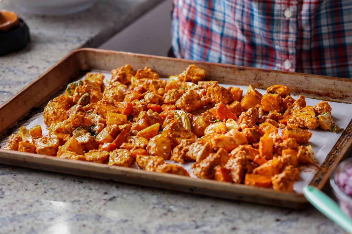veggies and tofu on the baking dish before baking