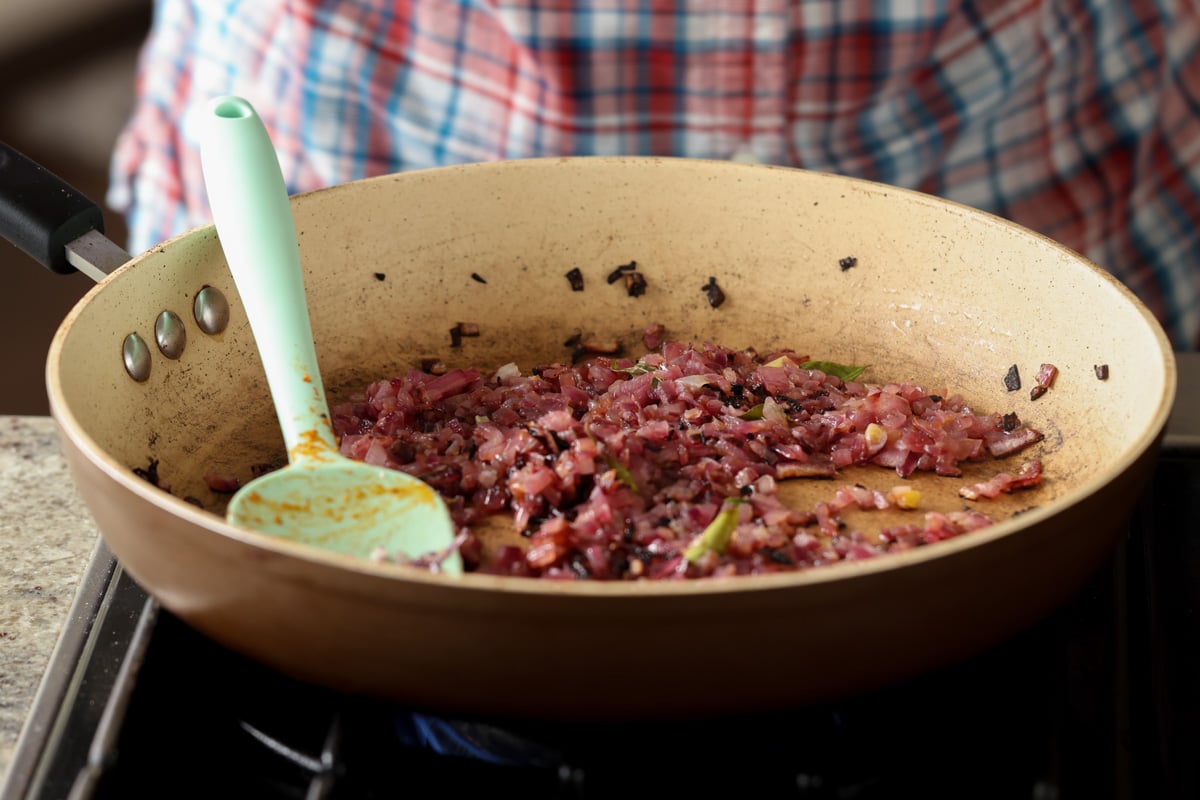 onions and curry leaves, after cooking