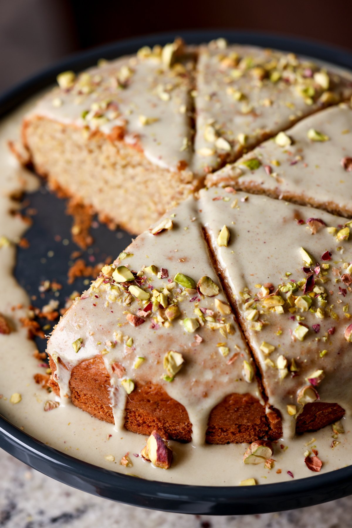 pistachio cake with a slice taken out