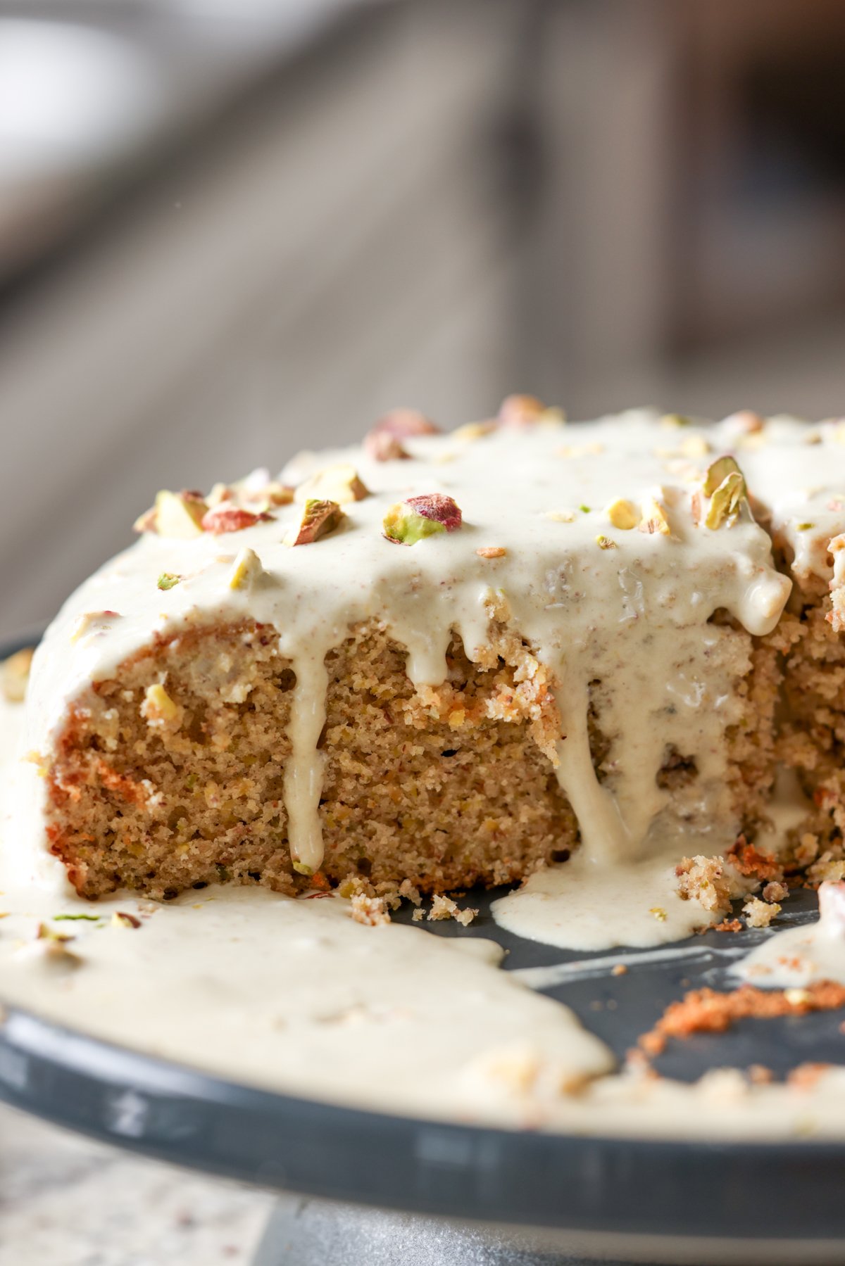 pistachio cake with pistachio cream on it