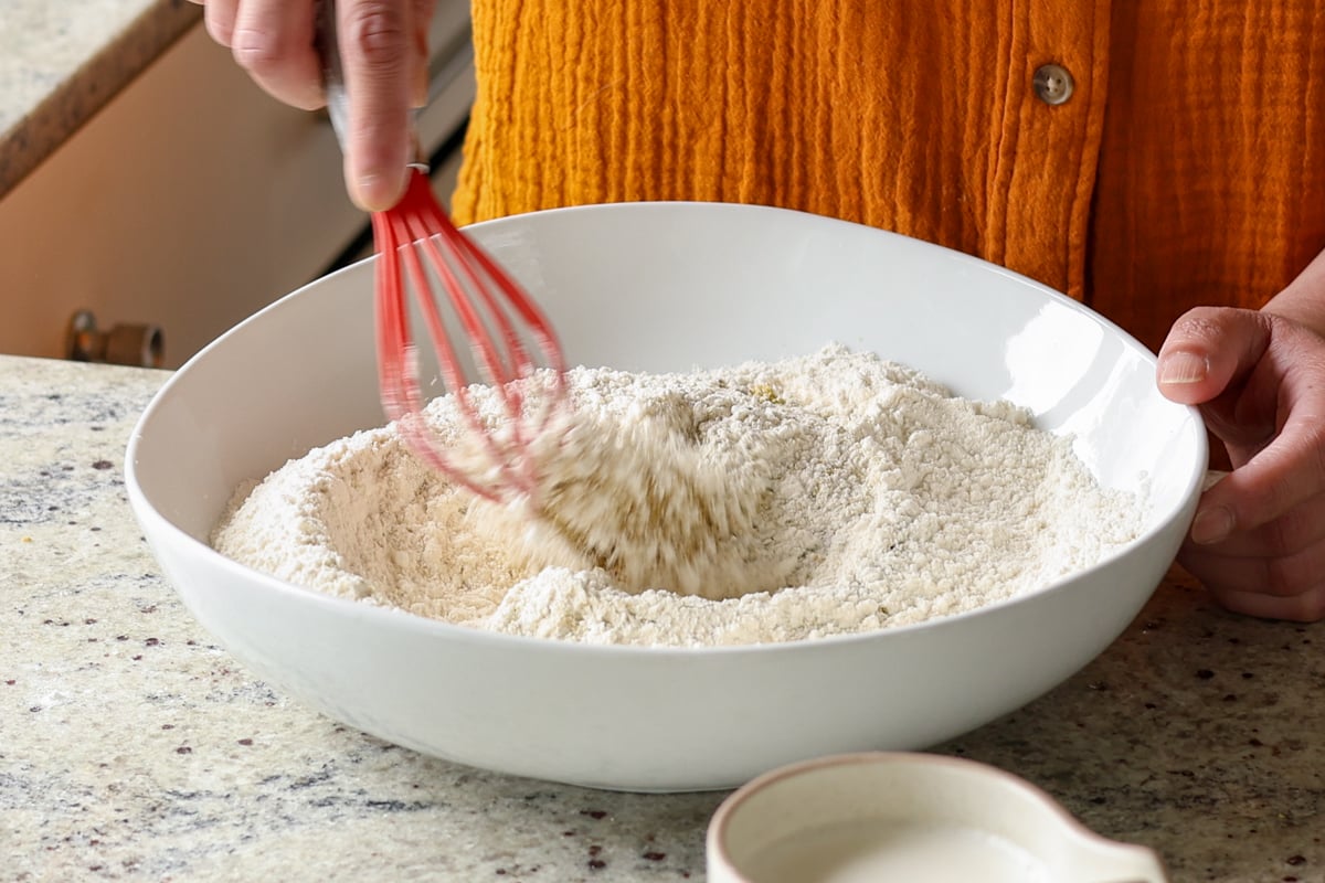 mixing the dry ingredients for the pistachio cake