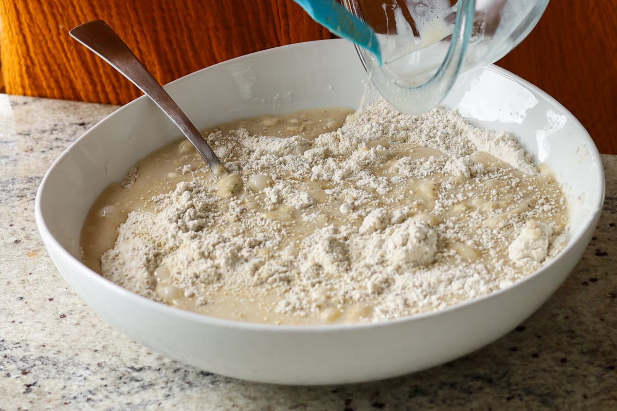 adding wet ingredients to the dry