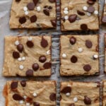 sliced white bean blondies on parchment paper