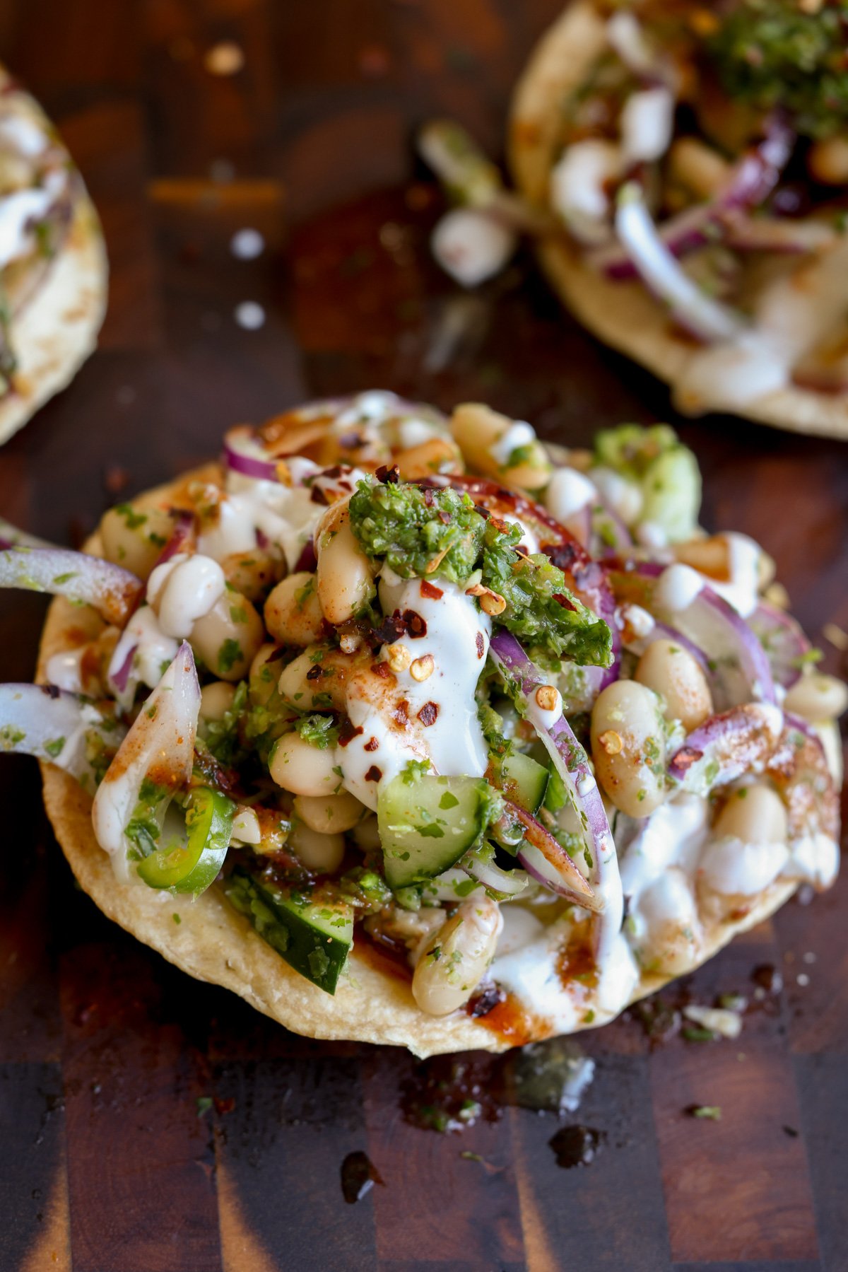 close-up of chutney bean tostadas on the cutting board