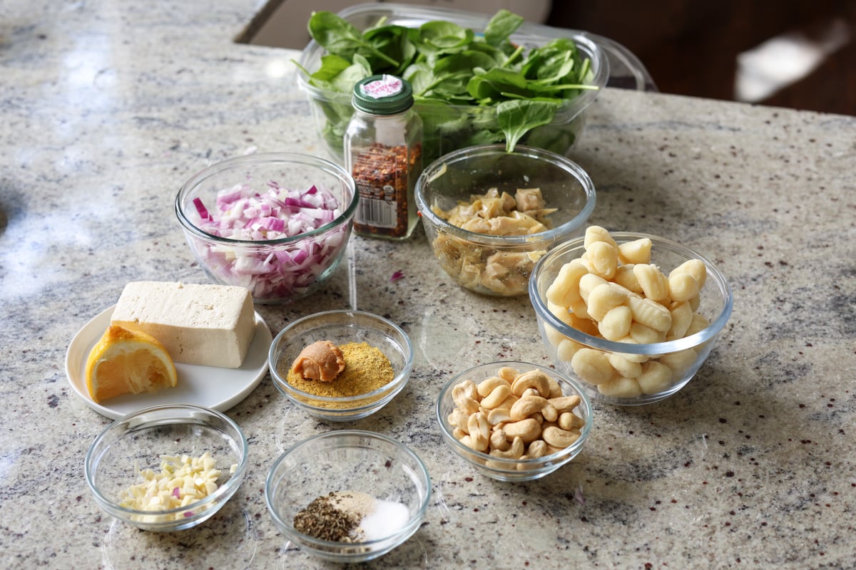spinach artichoke gnocchi ingredients on the kitchen counter