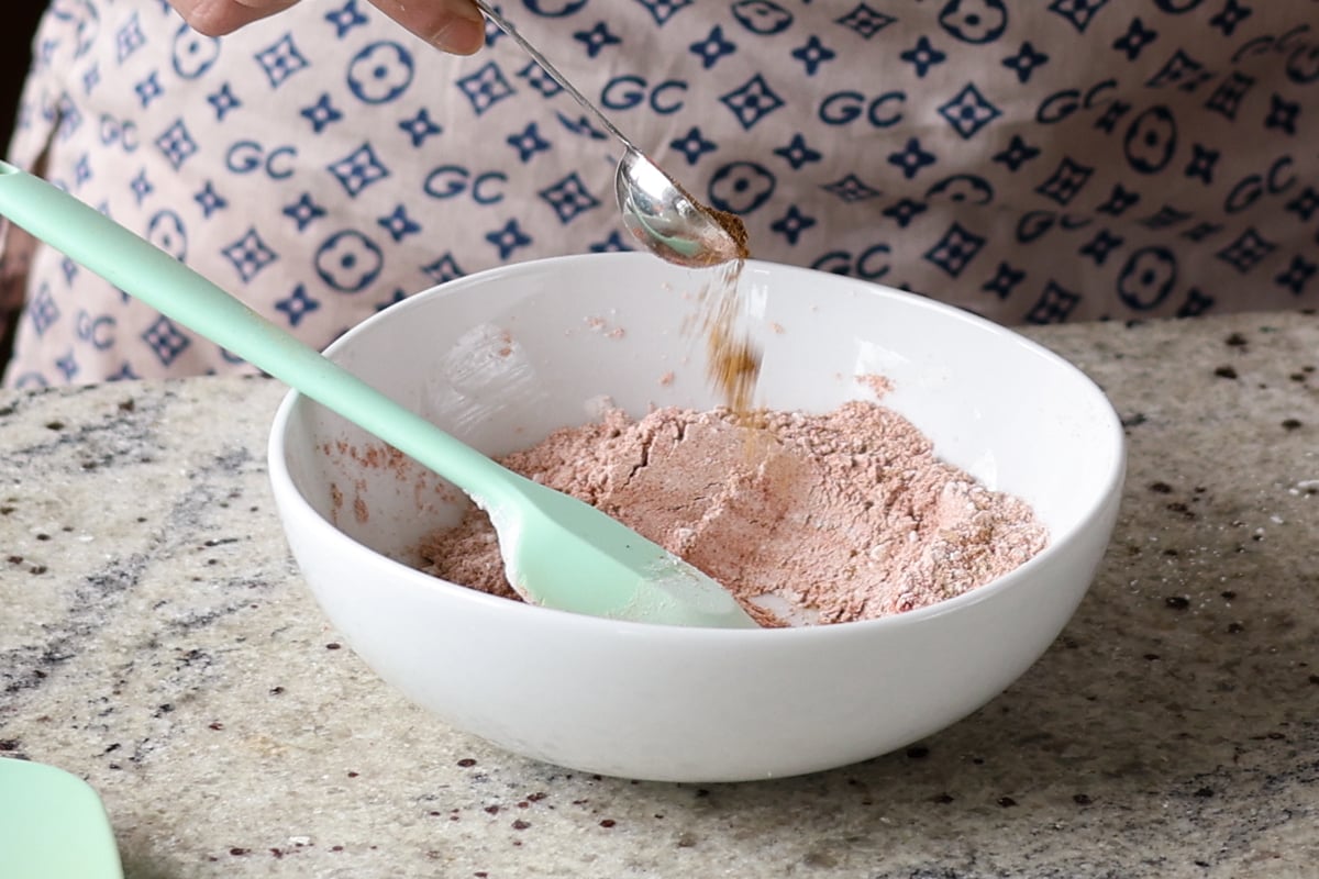 mixing up cornstarch and spices in the mixing bowl