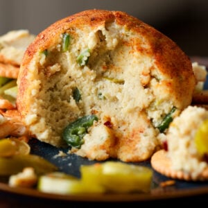 jalapeno popper cheese ball with scoops taken out, so you can see the inside texture