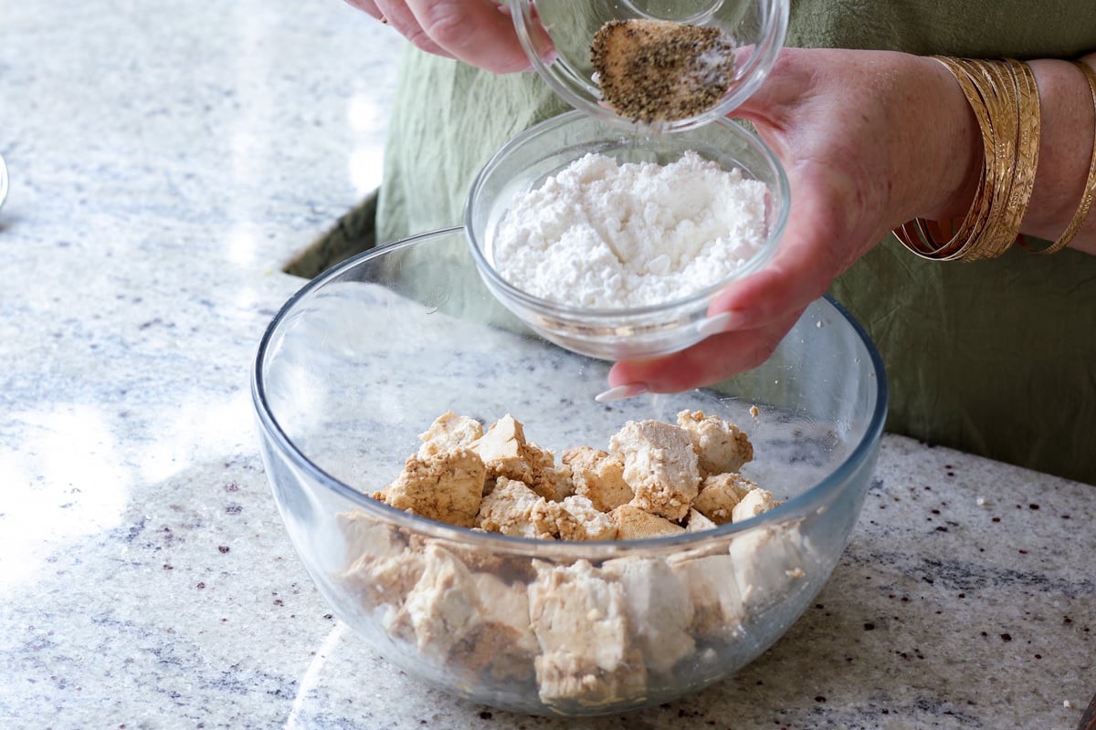 mixing the cornstarch, rice flour, and spices