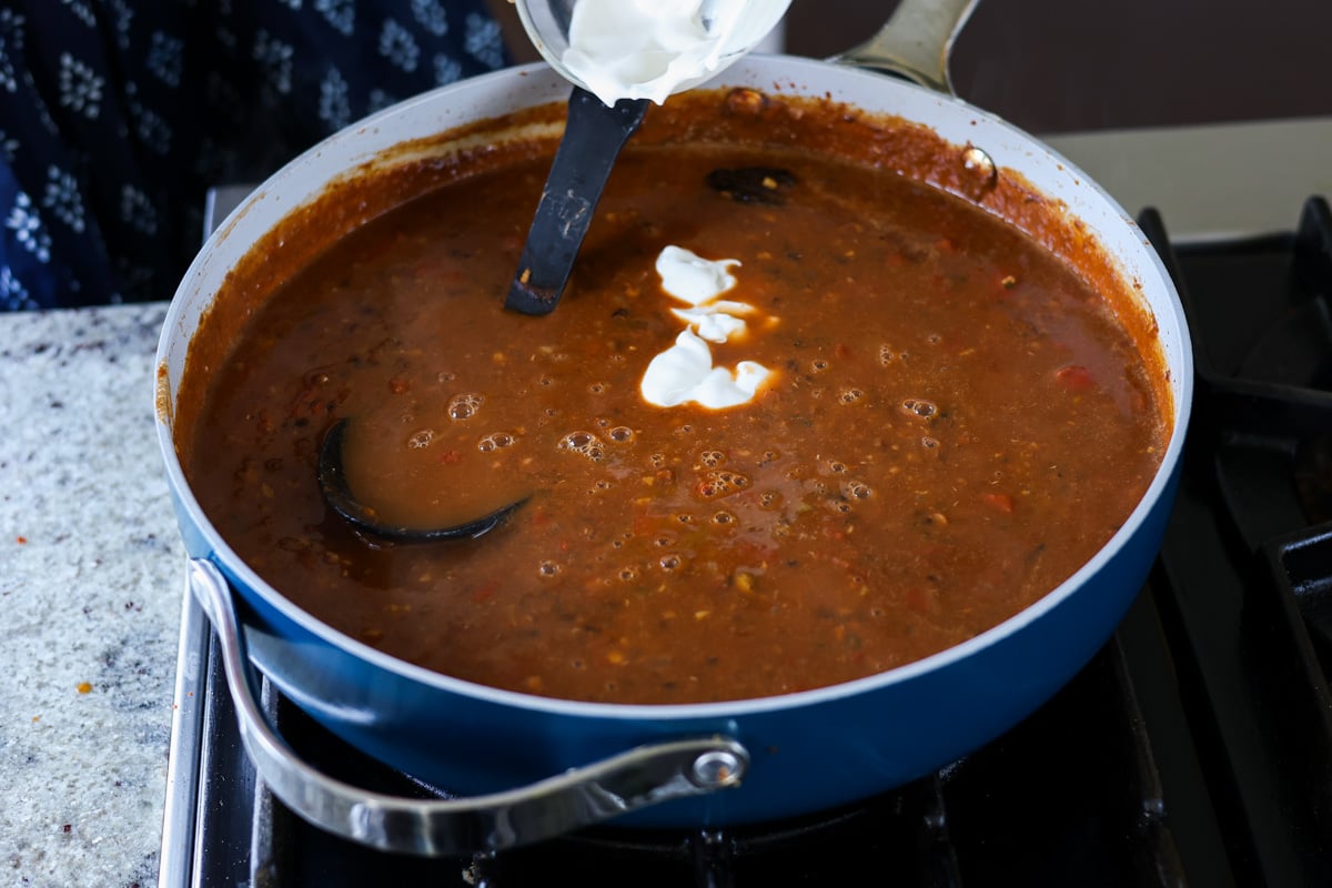 adding non-dairy yogurt to the pan