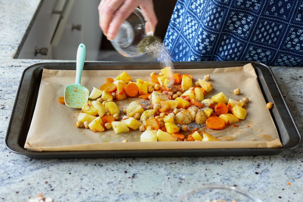 seasoning the veggies before roasting