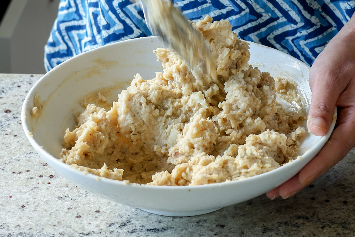 mixing bean puree into the caramelized onion mashed potatoes