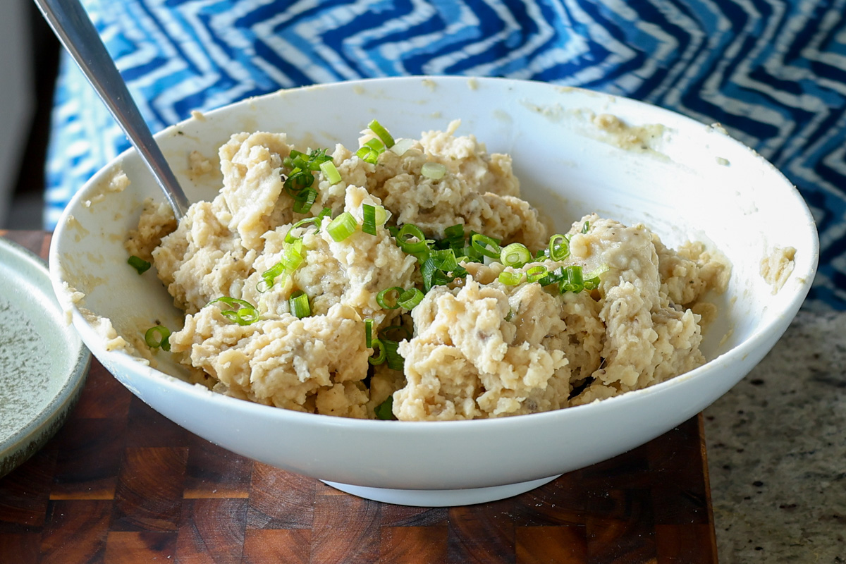 topping them with green onions