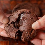 breaking open a lava cookie so you can see the inside