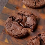 close-up of a broken open lava cookie on the cutting board