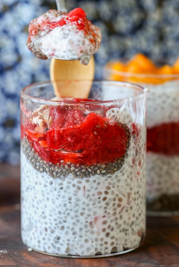 spoon taking a bite of strawberry chia pudding