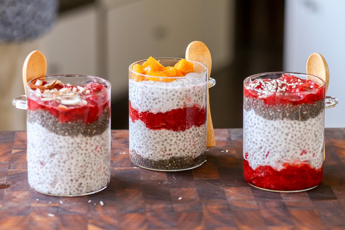strawberry chia seed pudding with different toppings