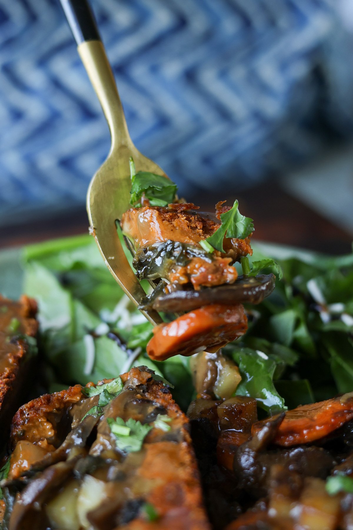 fork with a biteful of sun dried tomato roast