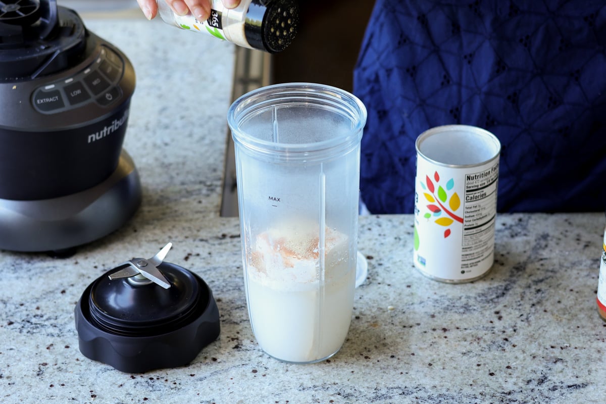 adding tofu chips ingredients to the blender