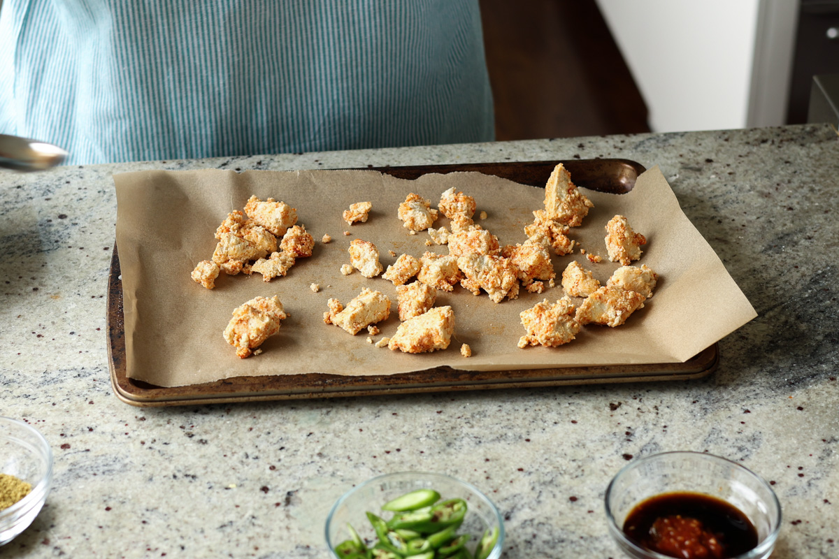 tofu on the baking pan before baking