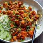 apollo tofu on a plate with rice and cucumber