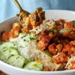 fork taking a bite of apollo tofu