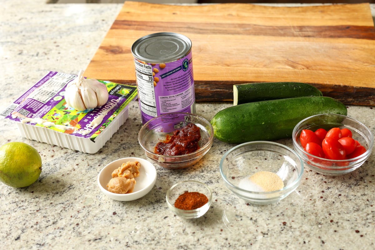 chipotle whipped tofu, roasted zucchini, and crispy lentils ingredients on the kitchen counter