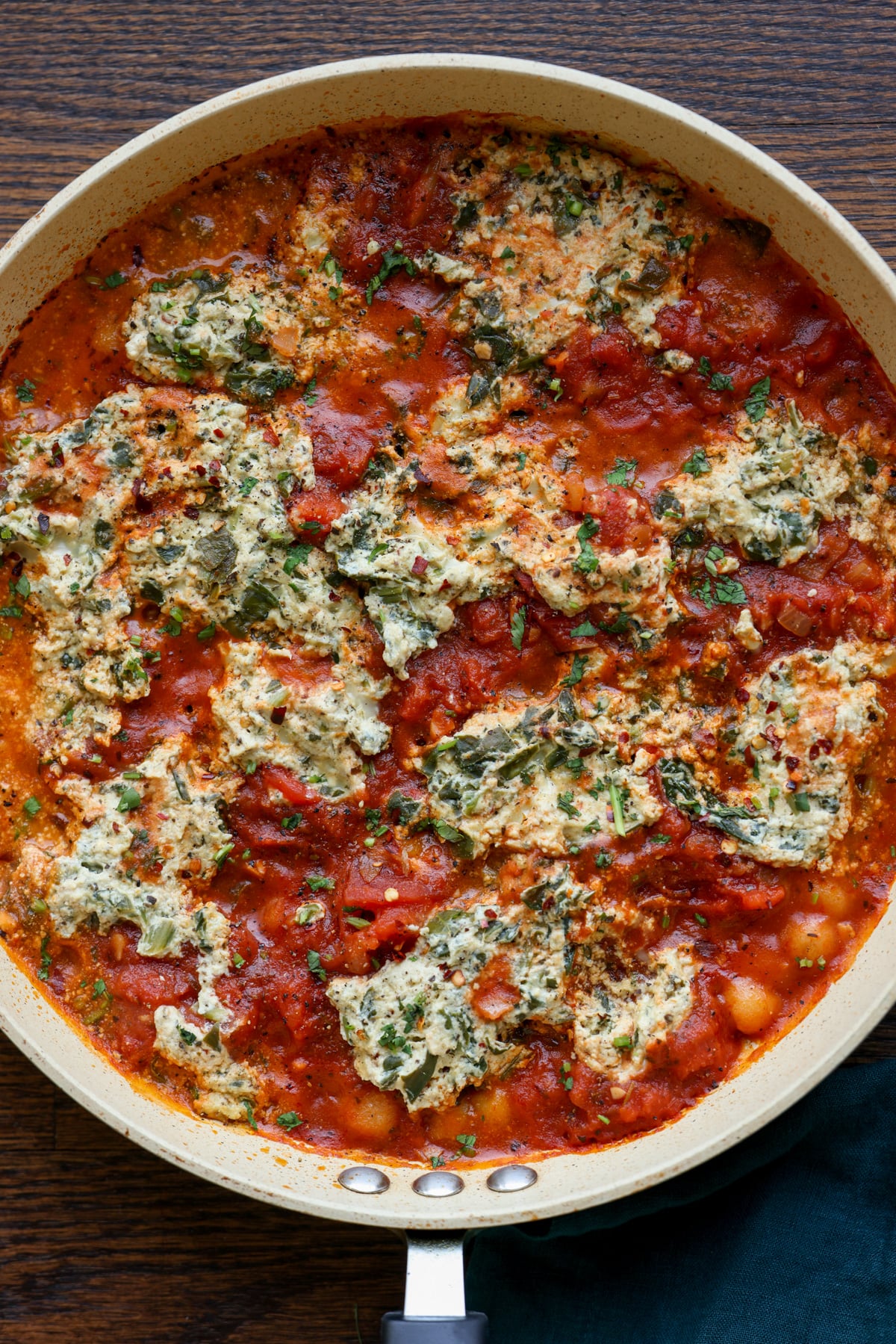 skillet gnocchi in the pan with tofu ricotta and sun dried tomato sauce