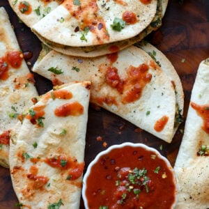 tofu ricotta tacos on a serving tray with marinara to dip