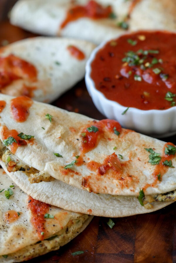 tofu ricotta tacos on a serving tray with marinara to dip