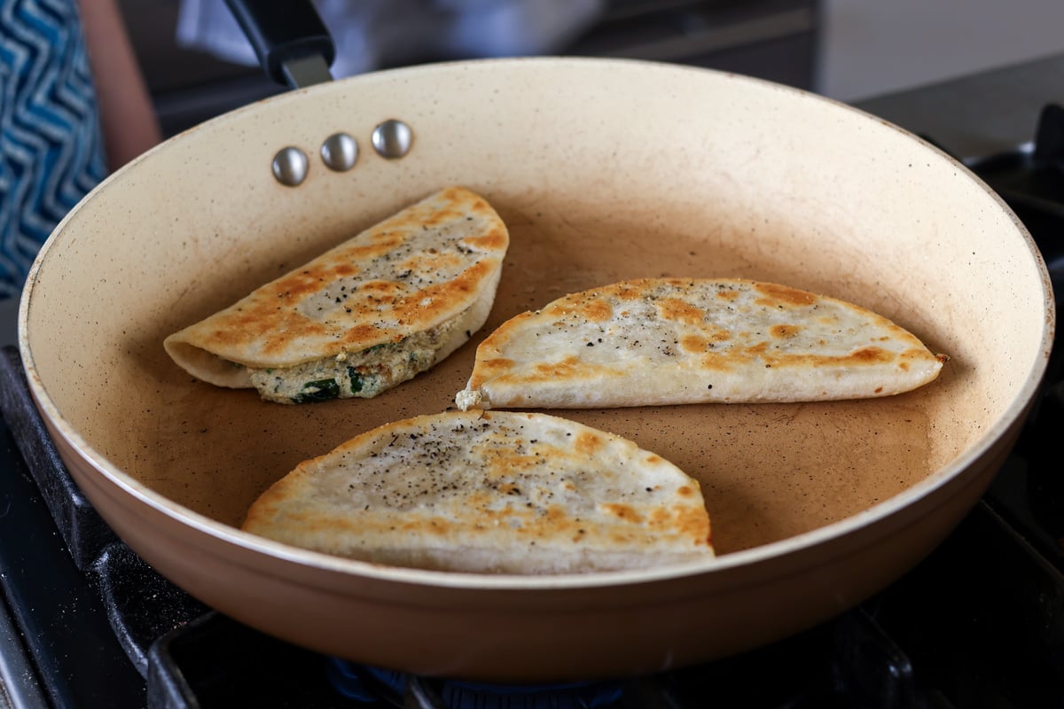 crispy ricotta tacos in the pan after cooking
