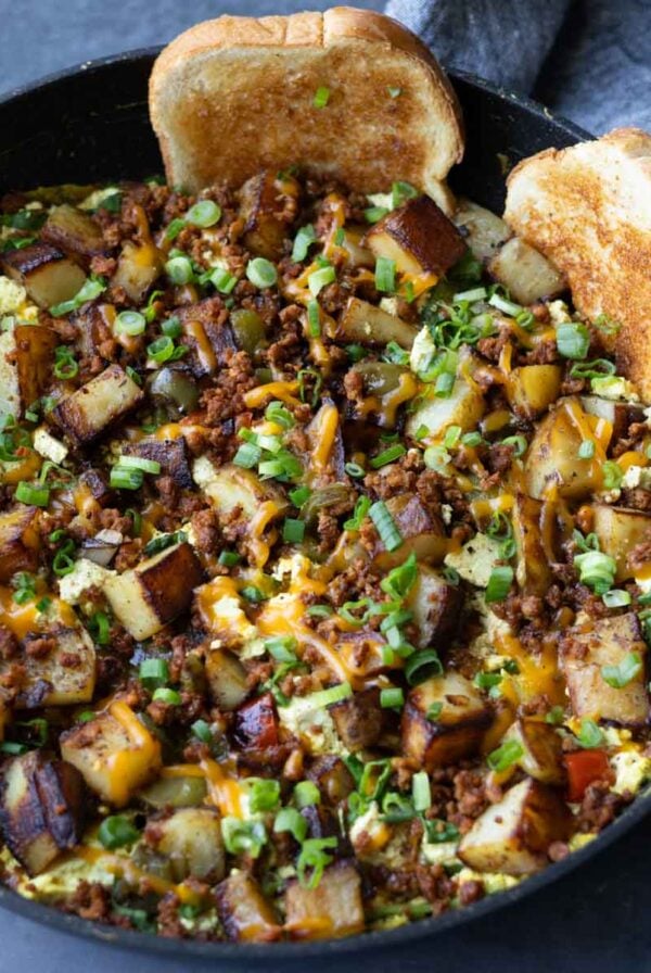 vegan country breakfast skillet in the pan with toast