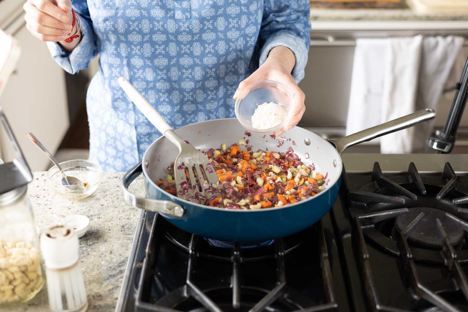 adding flour to the cooked veggies