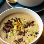 close-up of corn chowder in bowls with all the toppings